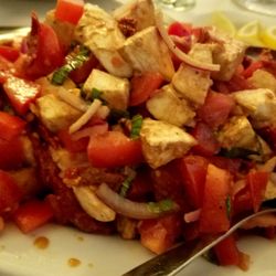 Cafe Figaro's - My favorite appetizer . Mozzarella cheese, tomato, onion and balsamic.