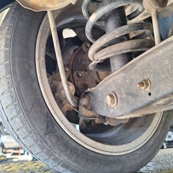 Full Line Auto Care in Norcross - They left these bolts off my caliper  in the rear driverside.