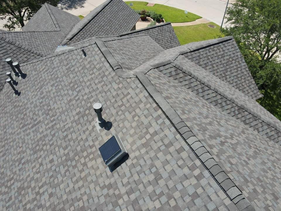 Slide of Core Four Roofing