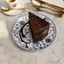 Grandma's Chocolate Cake. A dense chocolate cake with layers of frosting. Rich, clean, and balanced.