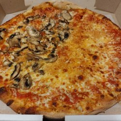 Paulie's Pizza & Wings - Medium 12" pie. Full garlic and half mushroom. SO good.