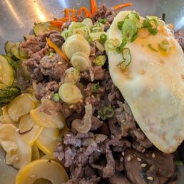 Bulgogi Bibimbap had a nice flavor and perfect combo of veggies. I could eat this everyday! I ordered it without lettuce. Bulgogi Bibimbap had a nice flavor and perfect combo of veggies. I could eat this everyday! I ordered it without lettuce.