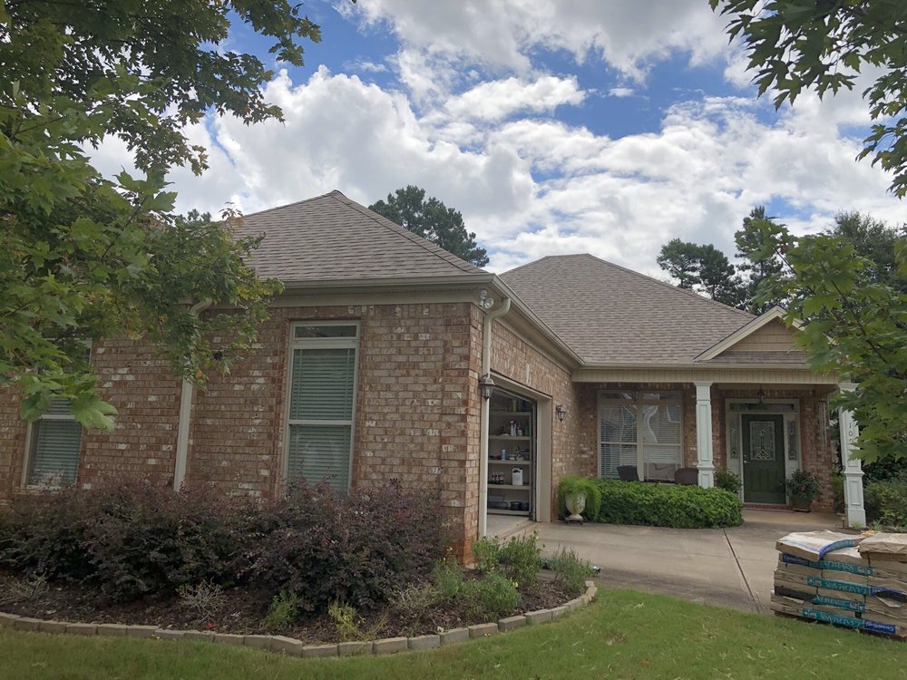 Slide of Spartan Roofing Solutions