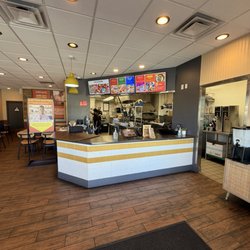 Inside the shop with various menu items
