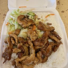 $8.99 for rice that filled up the whole bottom and little steamed chopped cabbages and carrots and chicken $8.99 for rice that filled up the whole bottom and little steamed chopped cabbages and carrots and chicken