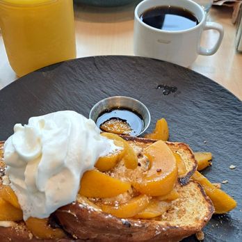 The Bro’Kin Yolk - Peach cobbler on deliciously crunchy French toast. So yummylicious! - Breakfast & Brunch Near Me - Canmore, Alberta The Bro’Kin Yolk - Peach cobbler on deliciously crunchy French toast. So yummylicious! - Breakfast & Brunch Near Me - Canmore, Alberta