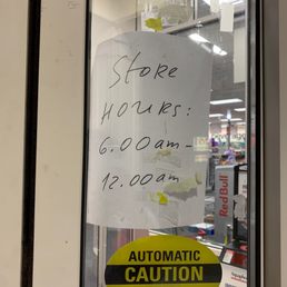 a sign in the window of a store