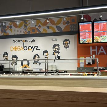 Dosa Boyz - a restaurant counter with a variety of food items - Indian Near Me - Toronto, Ontario