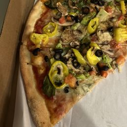 a slice of pizza in a box a slice of pizza in a box