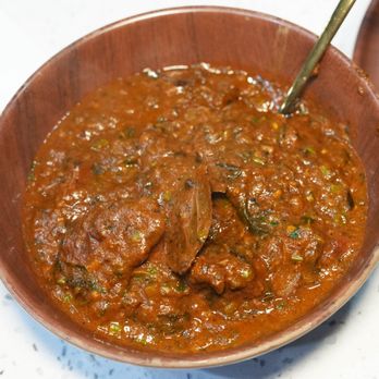 Monk’s - The GONGURA MUTTON CURRY (from Andhra Pradesh) is spicy and flavorful and goes really well with their GARLIC NAAN, as well as their BIRYANIS - Chinese Near Me - Irving, Texas