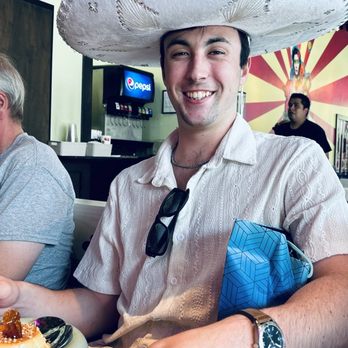 Que Chula - Birthday man after the sing! - Tacos Near Me - Chapel Hill, North Carolina