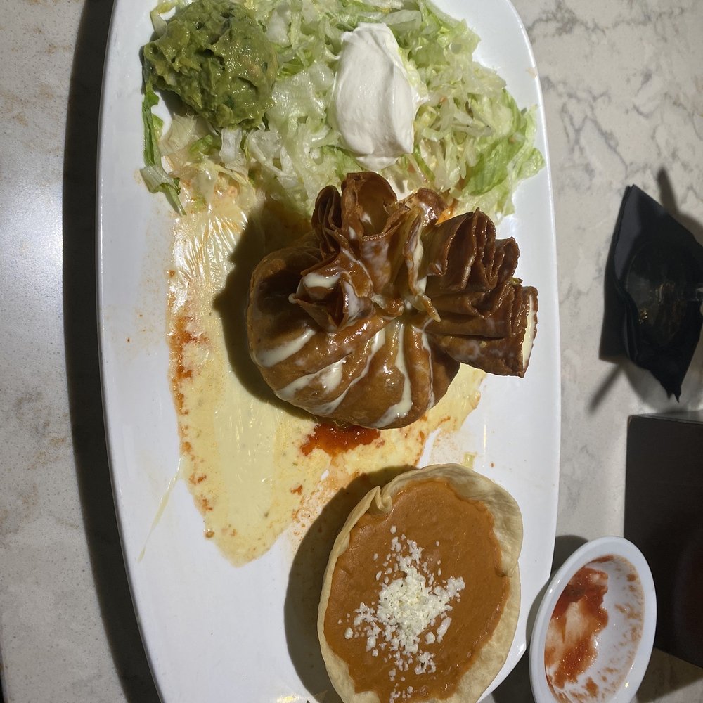 Chicken chimichanga with refried beans Chicken chimichanga with refried beans