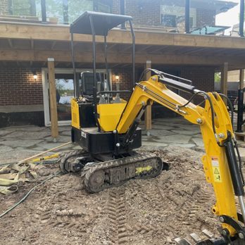 Oxley Property Maintenance - excavator in front of a house - Lawn Services Near Me Oxley Property Maintenance - excavator in front of a house - Lawn Services Near Me