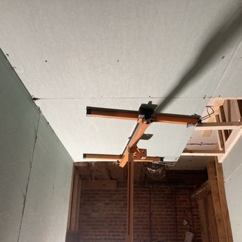 Green Eye Construction - Installing sheet rock - Flooring Near Me - New Orleans, Louisiana Green Eye Construction - Installing sheet rock - Flooring Near Me - New Orleans, Louisiana