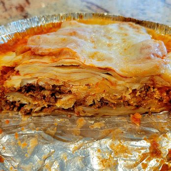 Mamma Lucia Italian Restaurant - Cross-section of the Lasagna Bolognese. Notice that the top 4 layers of lasagna noodles have nothing between them. - Italian Near Me - Dunkirk, Maryland