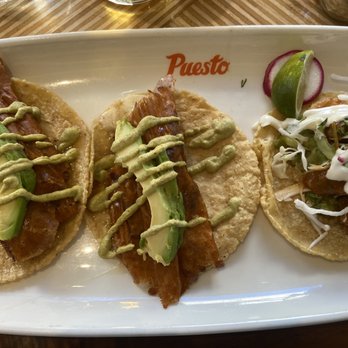 Puesto Concord - 2 Filet Mignon tacos (left) and one Baja Fish (right) - Mexican Near Me - Concord, California Puesto Concord - 2 Filet Mignon tacos (left) and one Baja Fish (right) - Mexican Near Me - Concord, California