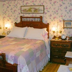 The Garden Cottage Bed and Breakfast - Lilac Room This darling room has its own entrance from the garden.