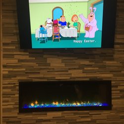 VAR Home Improvements - Look at that fireplace! Set up tv wires too, so yay Netflix