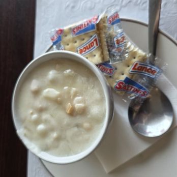 The Net By George - Cup of New England clam chowder - Seafood Near Me - Flagler Beach, Florida The Net By George - Cup of New England clam chowder - Seafood Near Me - Flagler Beach, Florida