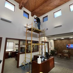 Roadrunner Tint and Security - Installing Evening View 5% film to cut heat and glare while improving comfort and energy efficiency in this office space!