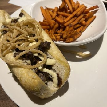 Yard House - House Cheesesteak and Sweet Potato Fries - New American Near Me - Atlanta, Georgia Yard House - House Cheesesteak and Sweet Potato Fries - New American Near Me - Atlanta, Georgia