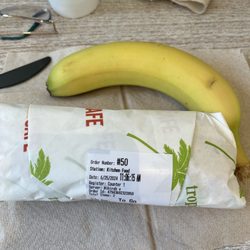 Tropical Smoothie Cafe - Wraps come with choice of chips, banana or apple.