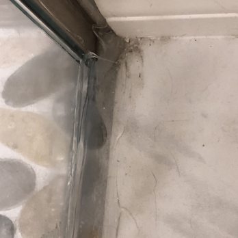Smokey's Mirrors & Glass - Smokey's horrible caulking job. - Windows Installation Near Me - Bradenton, Florida Smokey's Mirrors & Glass - Smokey's horrible caulking job. - Windows Installation Near Me - Bradenton, Florida