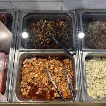 Kim Chee Restaurant - Vegetable Bar. I love their cucumber Kim chee (above middle) and cabbage Kim cher (bottom middle) - Korean Near Me - Kailua, Hawaii Kim Chee Restaurant - Vegetable Bar. I love their cucumber Kim chee (above middle) and cabbage Kim cher (bottom middle) - Korean Near Me - Kailua, Hawaii