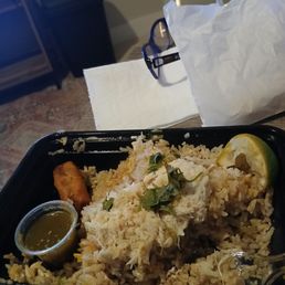 Crab fried rice and baby egg rolls.