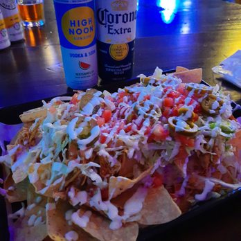 Gaswerks - a plate of nachos and a can of corona beer - Sports Bars Near Me - Columbus, Ohio