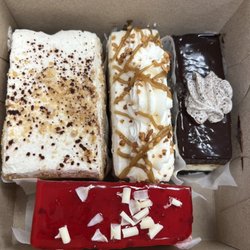 Cottage Bakery & Cafe - Napoleon, schmoo cake, Oreo cheesecake, white chocolate raspberry cheesecake.