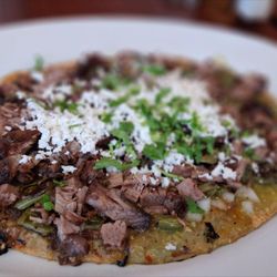 Los Carnalitos Restaurant - Huaraches con carne y nopales [with choice of meat--Carnitas (pork) and Cactus].