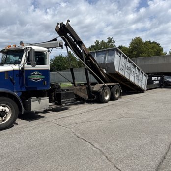 Dumpster Daddy - 30yd dumpster being dropped off. - Dumpster Rental Near Me Dumpster Daddy - 30yd dumpster being dropped off. - Dumpster Rental Near Me
