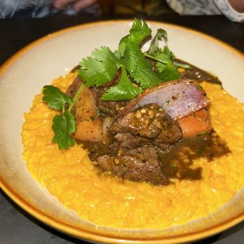 Amelia's 1931 - Lomo Saltado over Risotto - Cuban Near Me - Miami, Florida Amelia's 1931 - Lomo Saltado over Risotto - Cuban Near Me - Miami, Florida