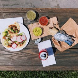 Carnitas tacos and Al Pastor Burrito definitely recommend getting sour cream on the burrito.
