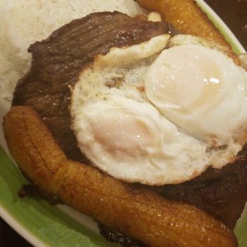 Don Alex Restaurant - steak, rice, and fried egg on a plate - Peruvian Near Me - Elizabeth, New Jersey Don Alex Restaurant - steak, rice, and fried egg on a plate - Peruvian Near Me - Elizabeth, New Jersey