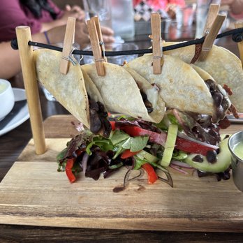 El Santo - Hanging quesadillas veggie version with bean and mushrooms. - Mexican Near Me - West Hartford, Connecticut El Santo - Hanging quesadillas veggie version with bean and mushrooms. - Mexican Near Me - West Hartford, Connecticut