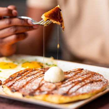 First Watch - a plate of food with pancakes and eggs - Breakfast & Brunch Near Me - Shawnee, Kansas