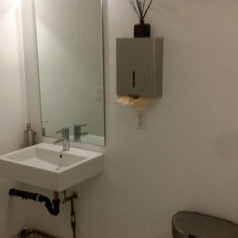 Bone Kettle - The sink is next to the door for convenience, with a simple paper towel/ trash can combo for a drying experience. - Breakfast & Brunch Near Me - Pasadena, California Bone Kettle - The sink is next to the door for convenience, with a simple paper towel/ trash can combo for a drying experience. - Breakfast & Brunch Near Me - Pasadena, California