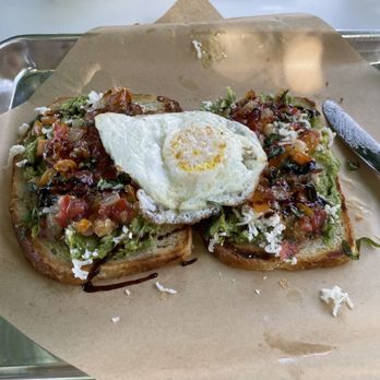 Cafe Stella - Avocado toast. With egg over easy. - Italian Near Me - Flagstaff, Arizona Cafe Stella - Avocado toast. With egg over easy. - Italian Near Me - Flagstaff, Arizona