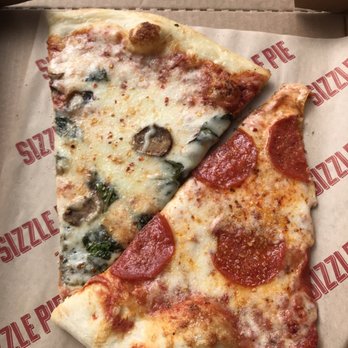 Sizzle Pie - Pepperoni & police/thieves (mushroom and spinach) - Pizza Near Me - Portland, Oregon Sizzle Pie - Pepperoni & police/thieves (mushroom and spinach) - Pizza Near Me - Portland, Oregon
