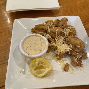 Pangea Tavern - Groupers, with a dipping sauce and lemons. - New American Near Me - Avon, North Carolina Pangea Tavern - Groupers, with a dipping sauce and lemons. - New American Near Me - Avon, North Carolina