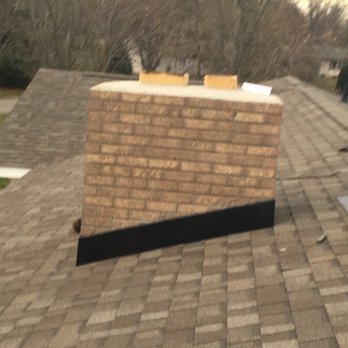 Eli's Home Improvements - Re-flashed chimney. - Roofing Near Me