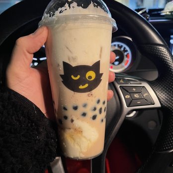 Cha Miao - a hand holding a cup of bubble tea - Bubble Tea Near Me - Markham, Ontario