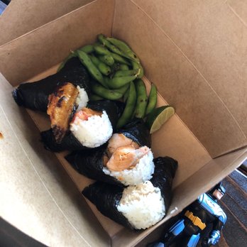 Oori Triangles - From Left to Right: Unagi, spicy tuna, salmon, and crab. - Japanese Near Me - Oakland, California Oori Triangles - From Left to Right: Unagi, spicy tuna, salmon, and crab. - Japanese Near Me - Oakland, California