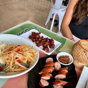 Sweet Rice - Lao style papaya salad. Sausage combo-Comes with sticky rice and tomato salsa. Pork Riblet's. - Thai Near Me - Dallas, Texas