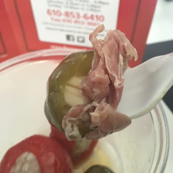 Pagano's - Red and Green Pepper Shooter: peppers stuffed with meats and cheese. A little spicy. - Delis Near Me - Drexel Hill, Pennsylvania Pagano's - Red and Green Pepper Shooter: peppers stuffed with meats and cheese. A little spicy. - Delis Near Me - Drexel Hill, Pennsylvania