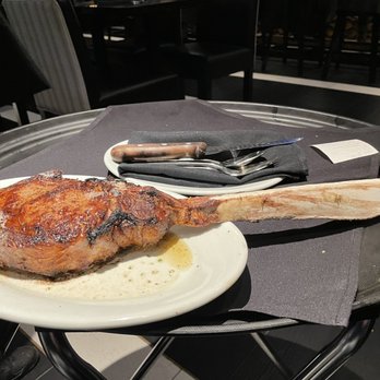 Ruth's Chris Steak House - Tomahawk waiting to be cut table side - Steakhouses Near Me - Short Hills, New Jersey Ruth's Chris Steak House - Tomahawk waiting to be cut table side - Steakhouses Near Me - Short Hills, New Jersey