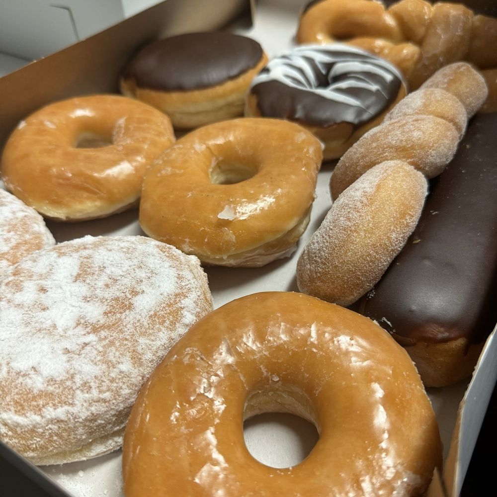 a variety of donuts in a box a variety of donuts in a box