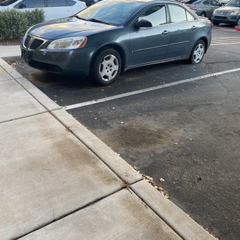 Encantada Queen Creek - Flat tire abandoned car preventing anyone to park in this normally free to park space. - Apartments Near Me - Queen Creek, Arizona Encantada Queen Creek - Flat tire abandoned car preventing anyone to park in this normally free to park space. - Apartments Near Me - Queen Creek, Arizona